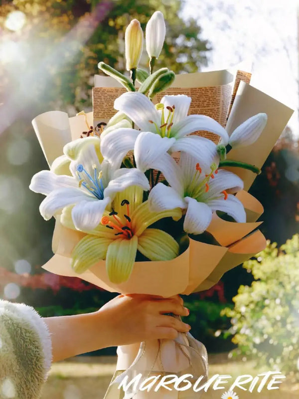 white and yellow lily bouquet wrapped